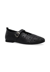 Schwarze flache Schuhe mit ausgeschnittenen dreieckigen Mustern, runder Zehenpartie und einem seitlichen Riemen mit einer silbernen Schnalle. Hergestellt aus glattem, synthetischem Material.