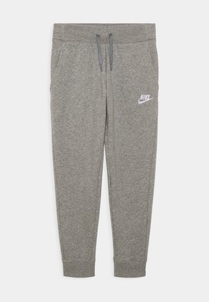 Szare spodnie dresowe Nike z elastycznymi ściągaczami, ściągaczem w pasie, bocznymi kieszeniami i białym logo Nike na górnej lewej części uda.