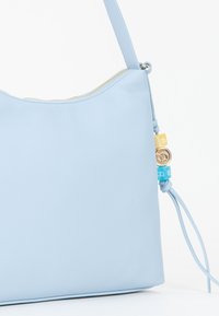 Miriade Borsa a mano - azzurro