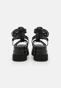 Koi Footwear THE DIVINE DESTRUCTION SPIKED CHUNKY  - Sandali con plateau - black