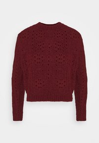 Maglione lavorato a maglia bordeaux con vestibilità ampia, caratterizzato da un motivo testurizzato di fori e polsini e orlo a costine. Collo rotondo e lunghezza corta.