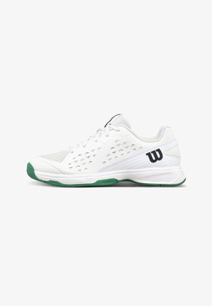 Weißer Sportschuh mit grünen Akzenten an der Sohle, atmungsaktivem Netzmaterial, Schnürsenkeln und schwarzem "W"-Logo an der Schuhferse.