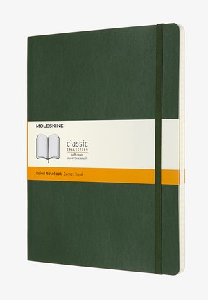 Green soft cover notebook with ruled pages, orange label detailing 'Moleskine Classic Collection,' and an elastic band closure.
