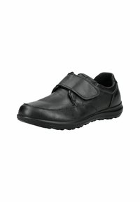 Black leather shoe with a round toe, synthetic sole, and a hook-and-loop closure strap, featuring smooth texture and minimal stitching details.