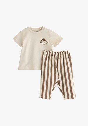 Kortærmet babybluse i cremefarve med abeansigt-grafik, kombineret med matchende creme- og brune bukser med lodrette striber og elastisk talje.