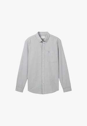 Kergest kangast nööpidega särk, millel on vertikaalsed tumesinised ja valged triibud, terav krae ja üks rinnatasku.