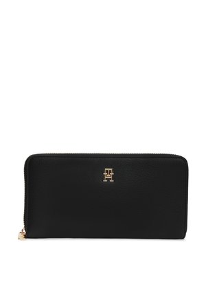 Schwarze Leder-Geldbörse mit Rundumreißverschluss, goldfarbenem Doppel-T-Logo und Reißverschlussschieber.
