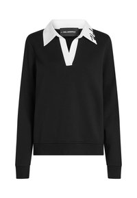 Sudadera negra con cuello de polo blanco, diseño de escote en V y mangas largas. Presenta un logo de Karl Lagerfeld en el cuello. Textura suave.