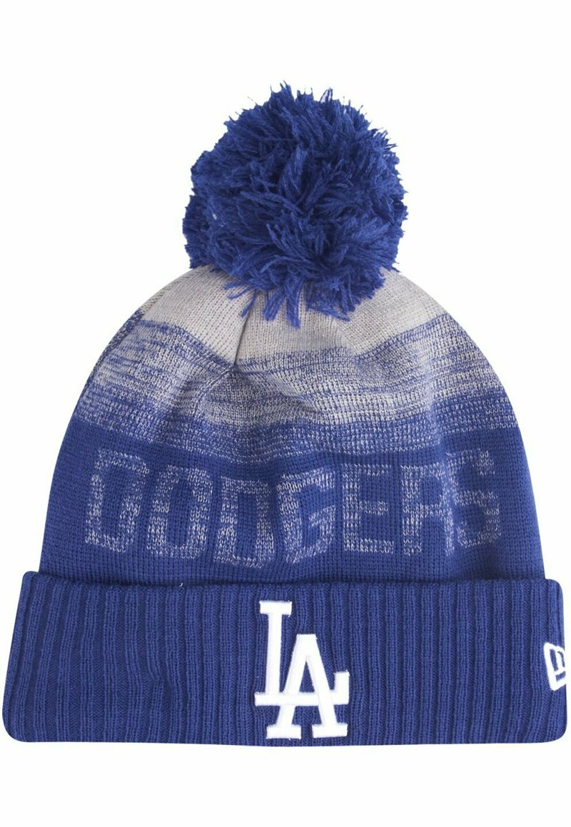 Gorro de punto azul con un puño acanalado texturizado. Presenta una parte superior con un patrón y un gran pompón azul. En la parte delantera se muestra "DODGERS" y el logo "LA" en blanco.
