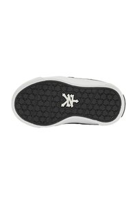 Black and white sneaker sole with hexagonal tread pattern and a white logo in the center against a plain white background.