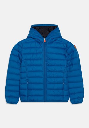 Padded blue jacket with a hood, featuring a front zipper with an orange pull, and ribbed cuffs. The surface has quilted lines for texture.