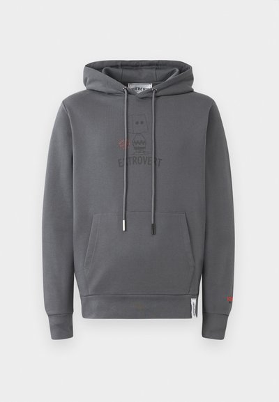 Grau-hoodie mit einer Kängurutasche, versehen mit einer Grafik eines extrovertierten Charakters und dem Wort "EXTROVERT" darunter gedruckt.