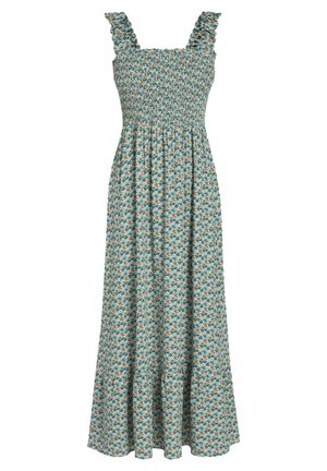 Robe maxi verte sans manches avec motif floral blanc, orange et bleu, corsage froncé et bretelles à volants.
