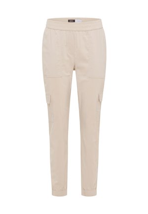 Pantalon cargo beige léger avec taille élastique, poches latérales à rabat et poignets élastiques à la cheville.
