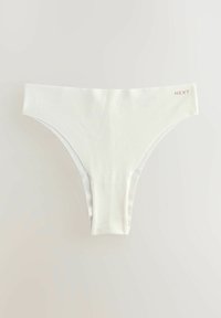 Valge stringalustamine, mis on valmistatud sujuvast ja elastsetest kangast. Omab minimalistlikku disaini, millel on roosa "NEXT" trükk vöökohtadel.