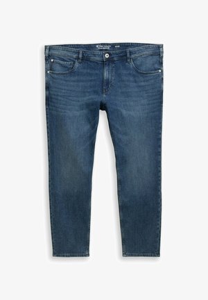 Sötétkék farmernadrág, egyenes lábbal, gombos cipzárral, öt zsebbel és enyhén kopott hatással. Klasszikus varrási részletek.