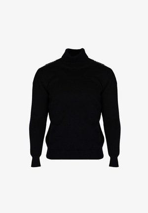 Pull en col roulé noir en tissu tricoté. Manches longues, coupe ajustée, détails texturés le long des épaules, ourlet et poignets côtelés.