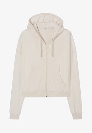 Kratka zip-up kapuca iz kremaste flanele, s kapuco, sprednjimi žepi in rebrastimi detajli na manšetah. Mehka tekstura in sproščen kroj.