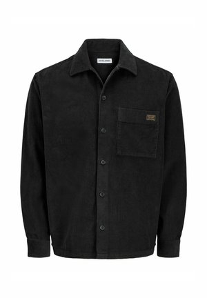Camisa chaqueta de pana negra con cierre de botones delanteros, cuello puntiagudo, bolsillo en el pecho y textura acanalada. Presenta botones negros y un parche con el logotipo.