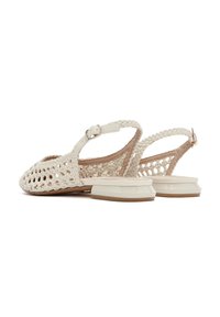 Woven, cream-colored slingback shoes with a braided strap, featuring a transparent block heel and a smooth, textured upper.