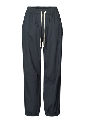 Pantalon de jogging en nylon noir avec taille élastique, cordon de serrage ajustable et poignets élastiques. Comprend une petite étiquette logo sur le côté.