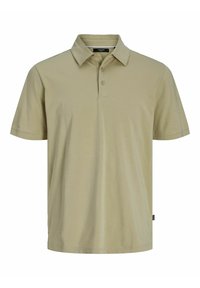 Polo a maniche corte in khaki chiaro, realizzato in tessuto morbido, con colletto a punta e patta con tre bottoni, dotato di orlo dritto.