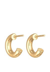 Orecchini ad anello in metallo tono oro con un design curvo e spesso e una finitura liscia e lucida; dotati di un sottile perno per un'indossabilità sicura.