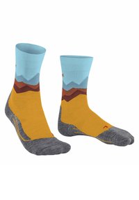Calzini multicolori con un bordo azzurro chiaro, design montano in marrone e giallo, tallone e punta rinforzati grigi e tessuto traspirante.