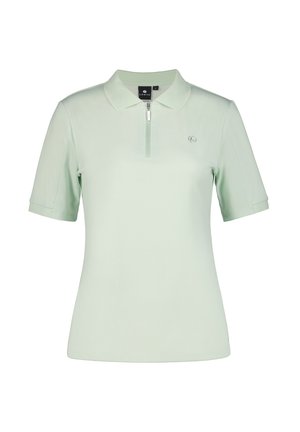 Mintgrön polo med dragkedja, korta ärmar och en mjuk yta. Har en liten logotyp på vänster sida av bröstet.