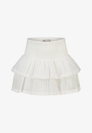 Mini-jupe blanche à volants avec taille élastique smockée et dentelle délicate sur tissu superposé.