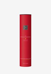Red cylindrical packaging for fragrance sticks, featuring embossed black logo and white text. Displays product name and scent details.
