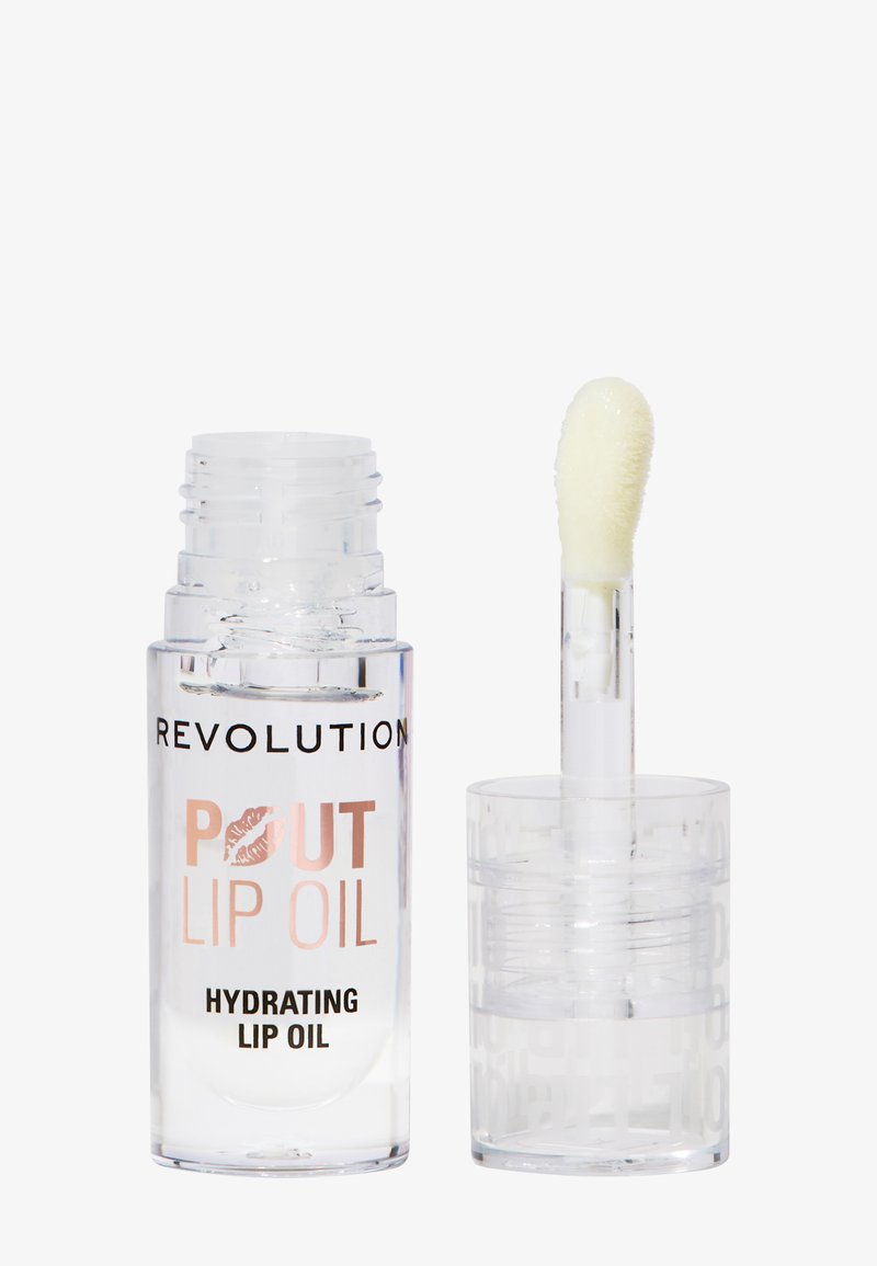 Gjennomsiktig plastflaske med leppeolje med rosa og svart tekst. Har en hvit applikatorstang med myk spiss. Inneholder en fuktighetsgivende formel.