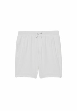 Valged vabaaja lühikesed püksid elastse vöökohaga ja ees oleva nööriga, küljetaskute ning lõdva lõikega.