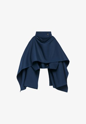 Navy blue skirt with asymmetric hem and layered fabric. Made of soft material, it features a high waist and a button detail at the waist.