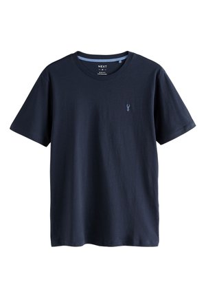 Kongeblå bomulds-t-shirt med korte ærmer, rund halsudskæring og et lille broderet logo på brystet. Slim fit design.