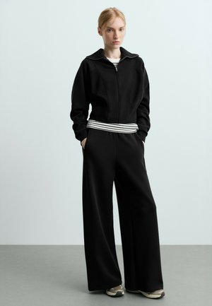 OYSHO, Pantalon de survêtement - black