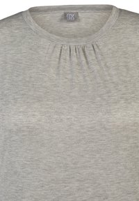 Light grey t-shirt in soft, textured fabric with a scoop neckline and gathered detail at the front, featuring a label at the neck.