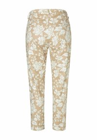 Beige Hosen mit floralem Muster und weißen Blumen. Mittelhoher Bund und schmal zulaufende Beine, aus glattem Baumwollmaterial und ohne sichtbare Beschläge.
