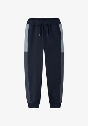 Marineblå joggebukser med elastisk taljebånd, snøre, lysegrå og mørkegrå sidestriber samt elastiske manchetter ved anklerne.
