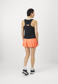 Nike Performance SLAM SKIRT - Αθλητική φούστα - wild mango