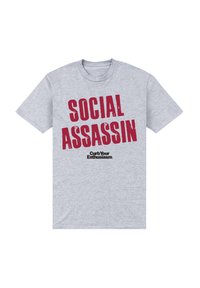 Camiseta de algodón gris con un texto rojo en negrita que dice "SASINOS SOCIALES" y un texto más pequeño en negro que dice "Controla tu entusiasmo". Con mangas cortas.