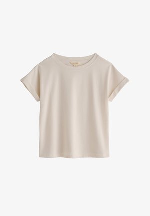 Beżowy t-shirt z krótkim rękawem, okrągłym dekoltem, podwiniętymi mankietami i luźnym krojem, prezentowany na białym tle.