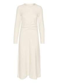 Vit långärmad klänning med rund halsringning. Har en rynkad midja och en strukturerad tyg, som faller till midjan på vaden. Dold dragkedja i ryggen.