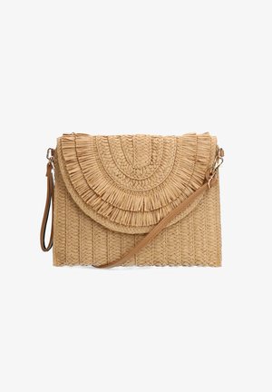 Woven straw handbag in Beige mit einem strukturierten, gerippten Design, einem fransigen Deckel und einem abnehmbaren Schultergurt. Hat eine runde Form.