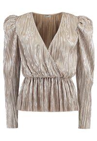 Metallic, pleated blouse in soft beige with a deep v-neck and gathered waist. Features long sleeves with puffed shoulders and textured fabric.