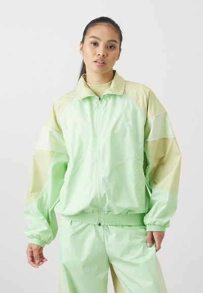 adidas by Stella McCartney TRACKTOP - Training jacket - glow green/halo gold