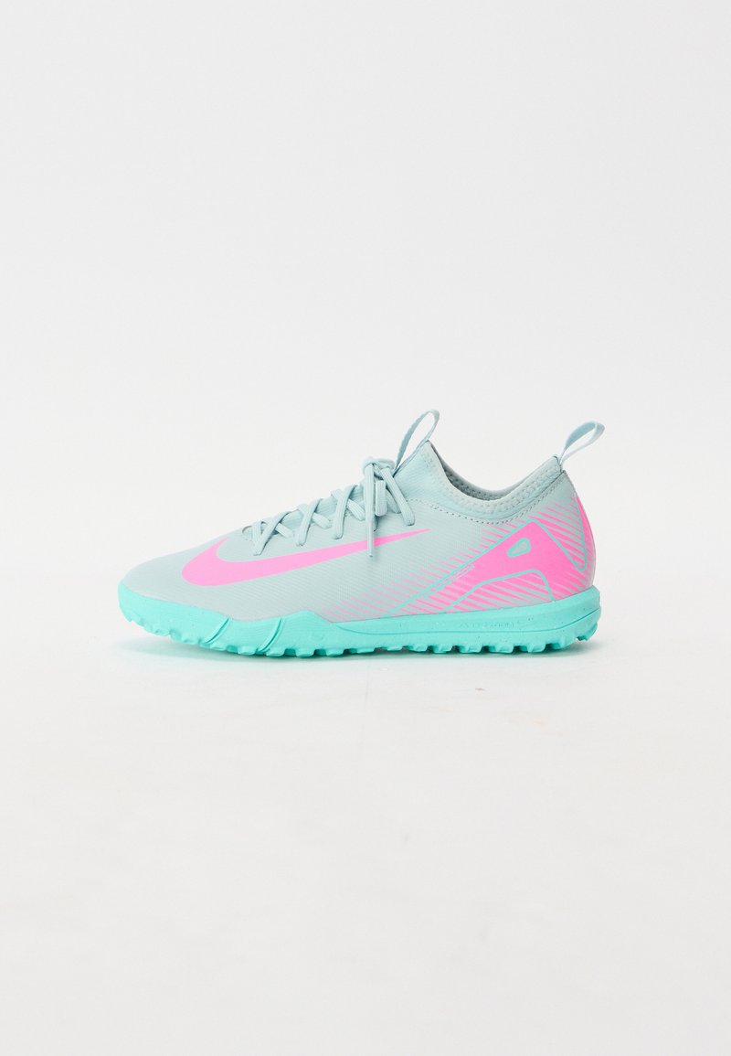 Light blue athletic shoes with pink accents, textured upper, and a mint green rubber sole. Features a streamlined design with laces.