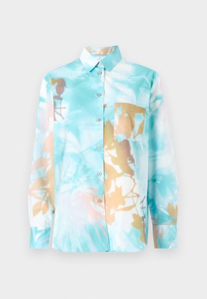 Collared long-sleeve shirt in light blue with abstract floral print in brown and cream. Features a front pocket and button closure.