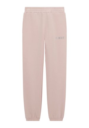 Light pink sweatpants with elastic waistband, ribbed cuffs, and side pockets. Features silver "GUESS" logo on the left thigh. Soft texture.