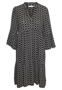 Vestido de patrón en blanco y negro con escote en V, mangas de tres cuartos acampanadas y un diseño en capas. Hecho de una tela ligera con una silueta fluida.